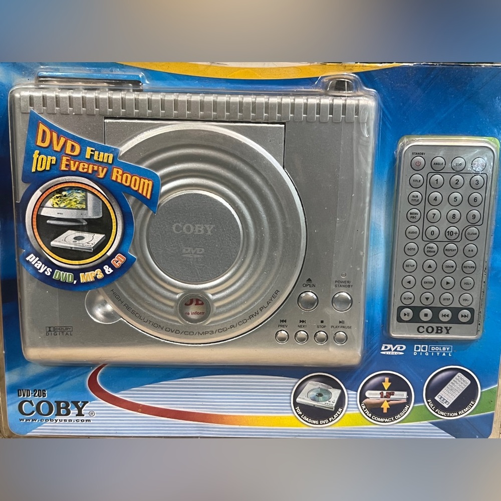 Coby ultra compact portable DVD/MP3/CD player w/remote-New/package damaged